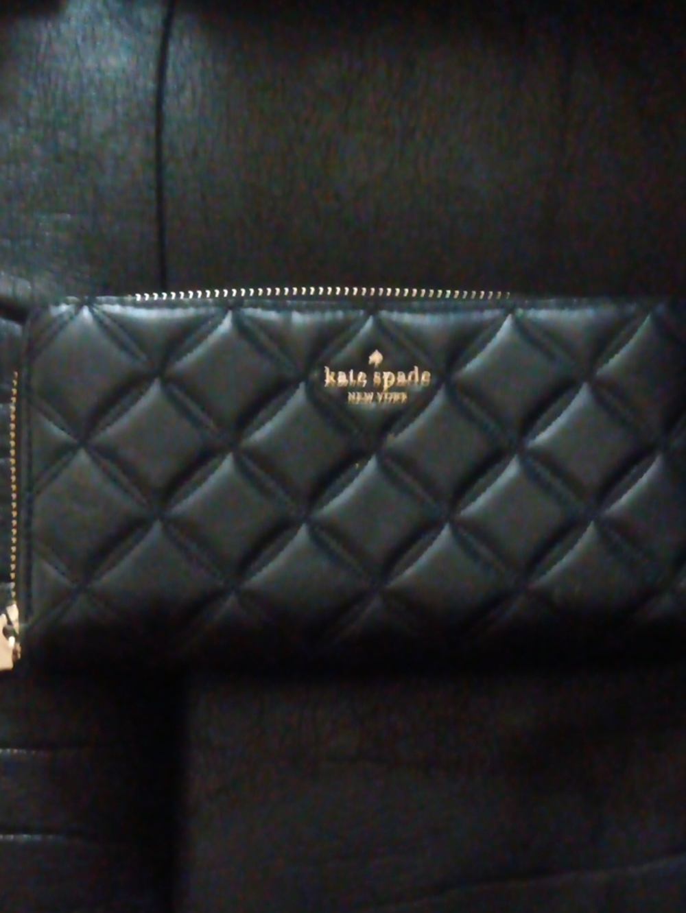 kate spade Black Quilted Zip-Around Wallet with Gold Logo